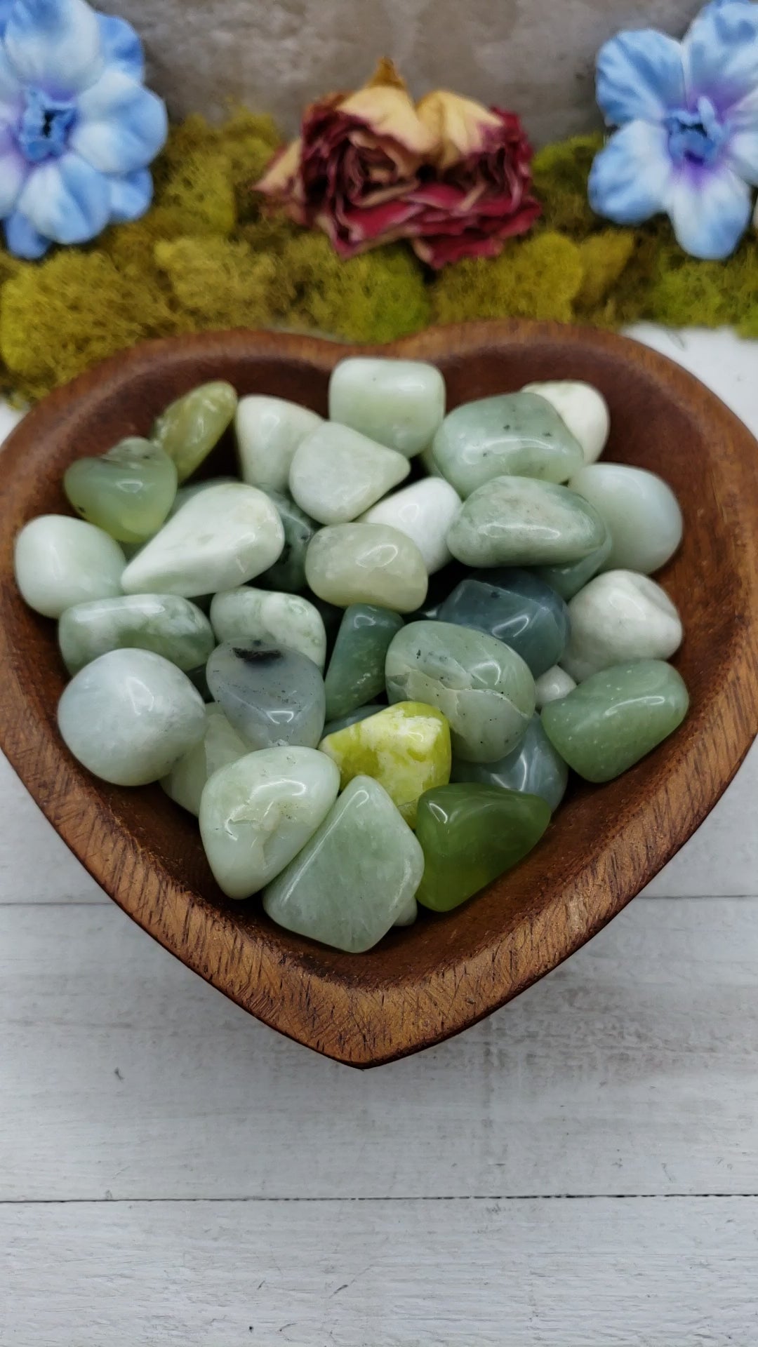 new jade stones in heart-shaped bowl