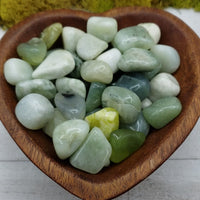 new jade stones in heart-shaped bowl