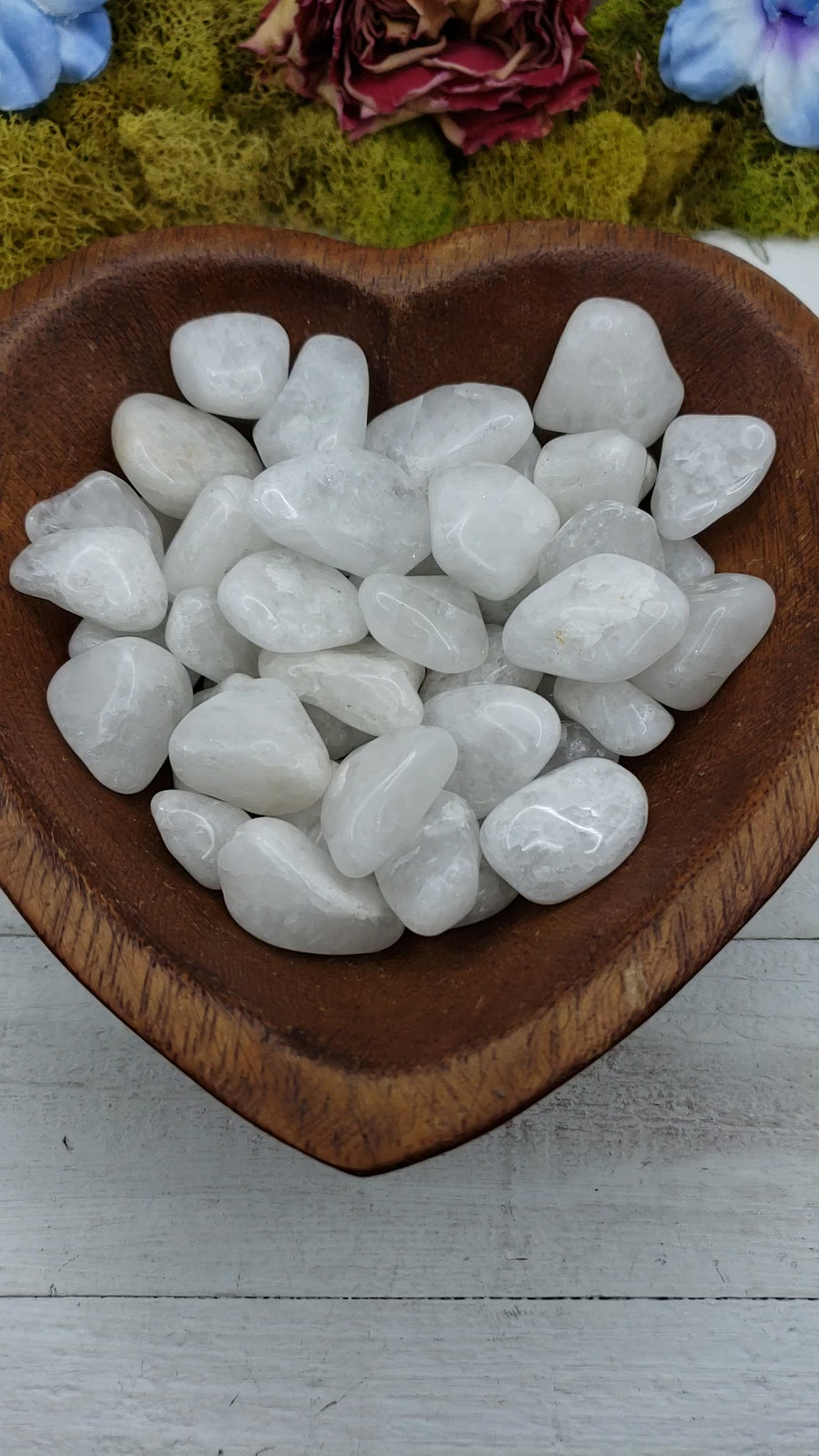 milky quartz stones in heart-shaped bowl