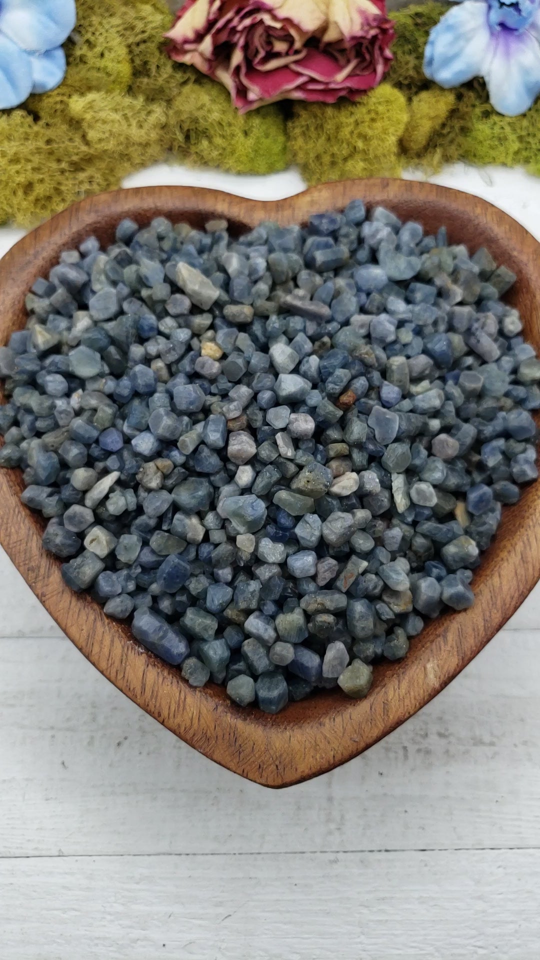 sapphire stones in heart-shaped bowl