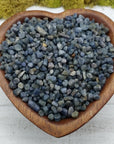 sapphire stones in heart-shaped bowl