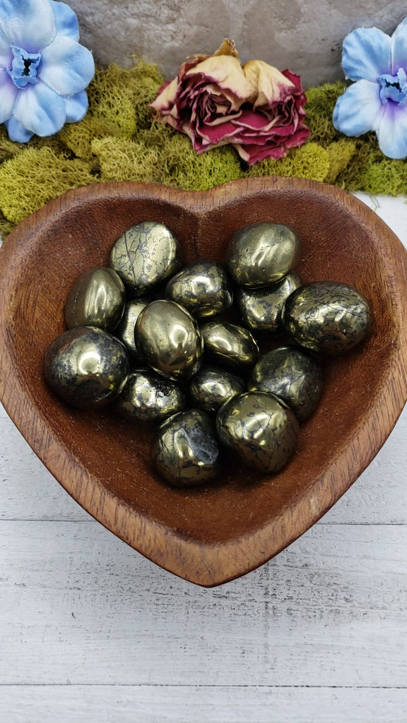 chalcopyrite stones in heart-shaped bowl