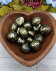chalcopyrite stones in heart-shaped bowl
