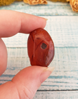 Carnelian Polished Tumbled Gemstone - One Stone or Bulk Wholesale Lots - Close Up of Natural Texture