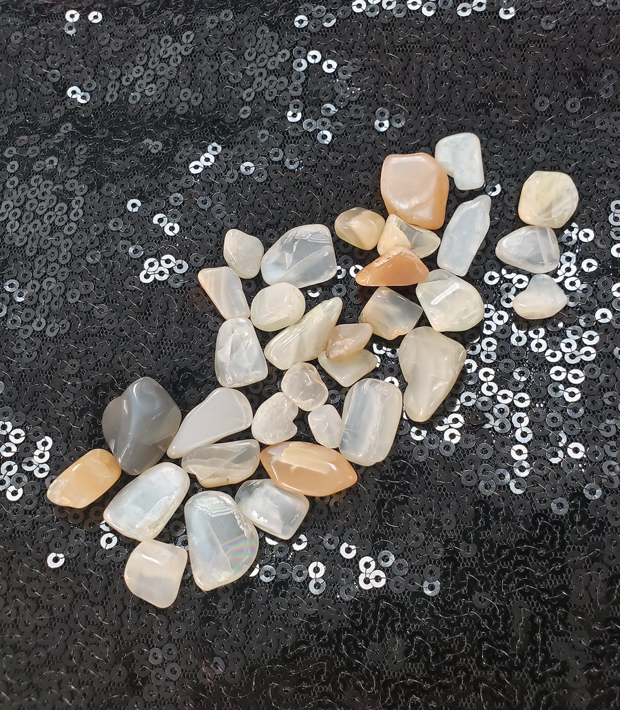 Mini Moonstone Tumbled Gemstone - Multi Stone or Bulk Wholesale Lots - Against Dark Background