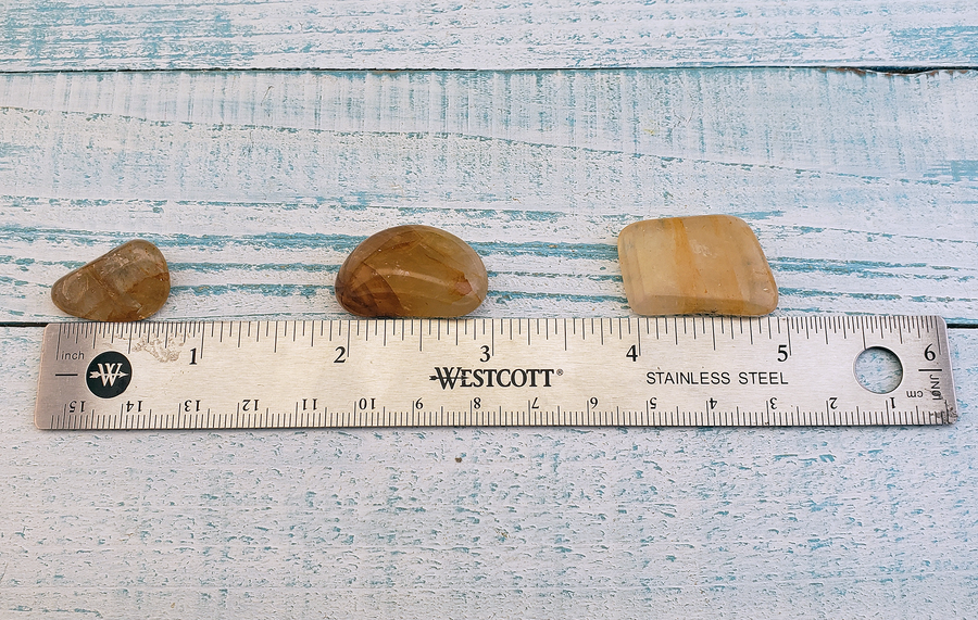 Hematoid Quartz Golden Healer Tumbled - Size Comparison