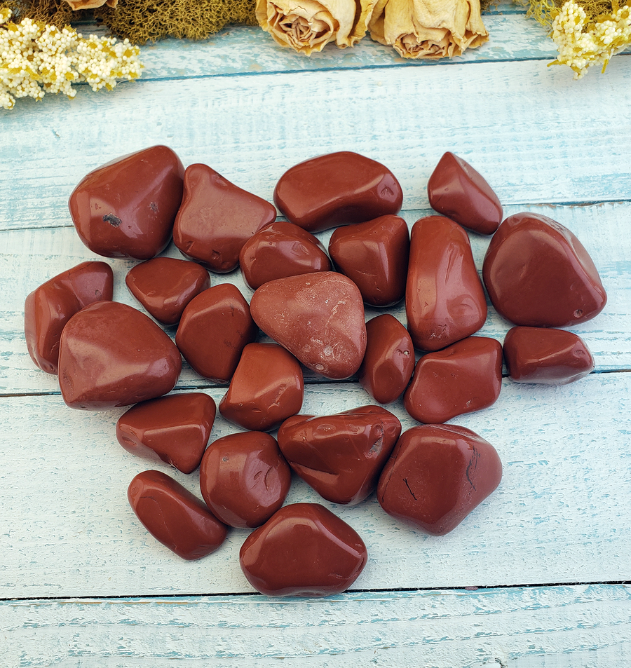 Red Jasper Natural Tumbled Gemstone - Group on Board