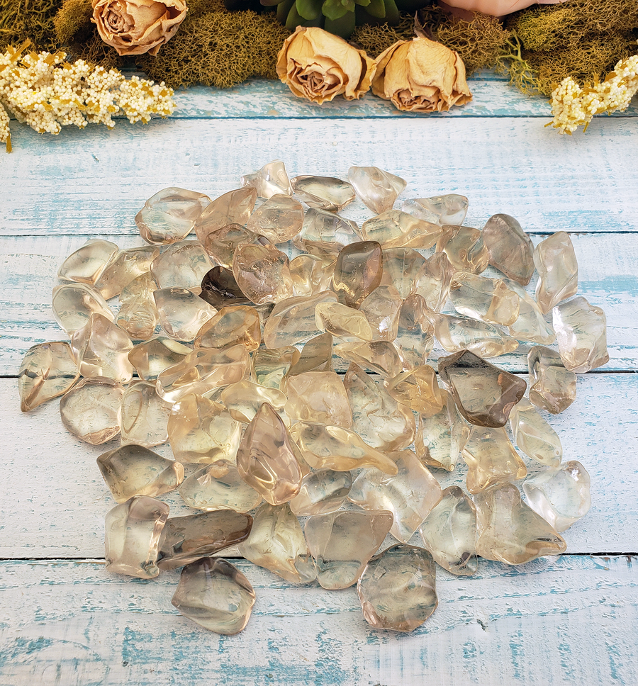 Pale Smoky Quartz Tumbled Gemstone - Group on Board