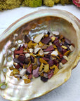 One ounce of mookaite chips in abalone shell