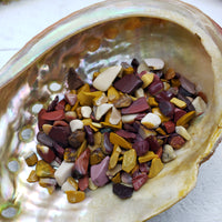 One ounce of mookaite chips in abalone shell