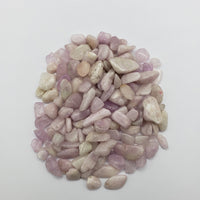 One ounce of kunzite stone chips on white background