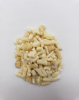 one ounce of bamboo coral chips on white background