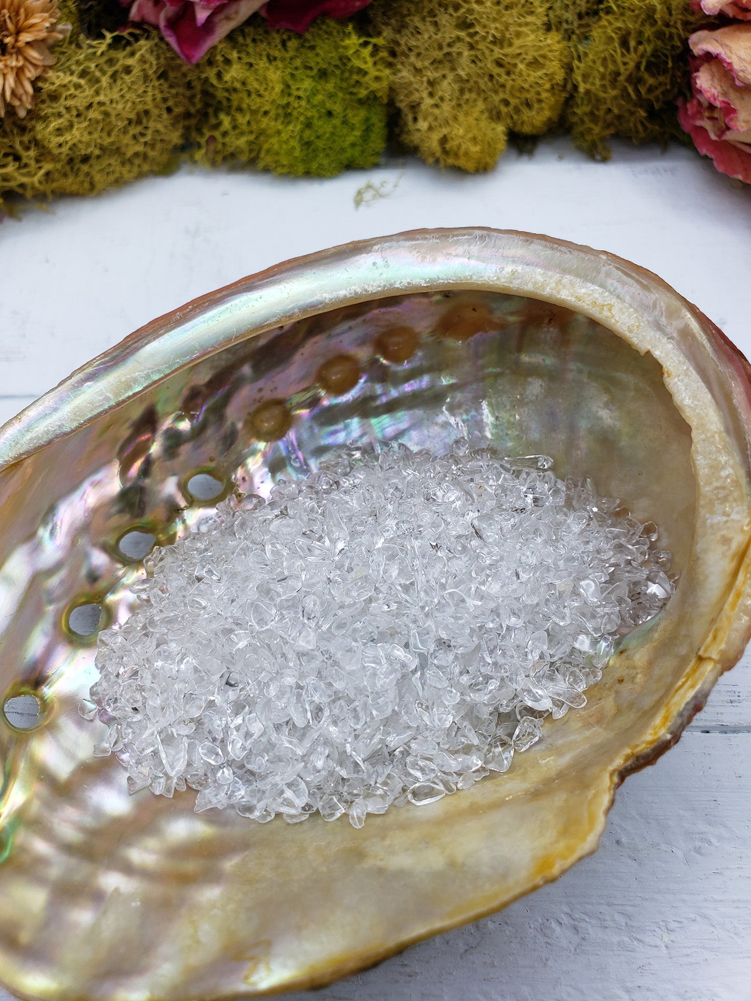 One ounce of quartz crystal chips in abalone shell