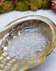 One ounce of quartz crystal chips in abalone shell