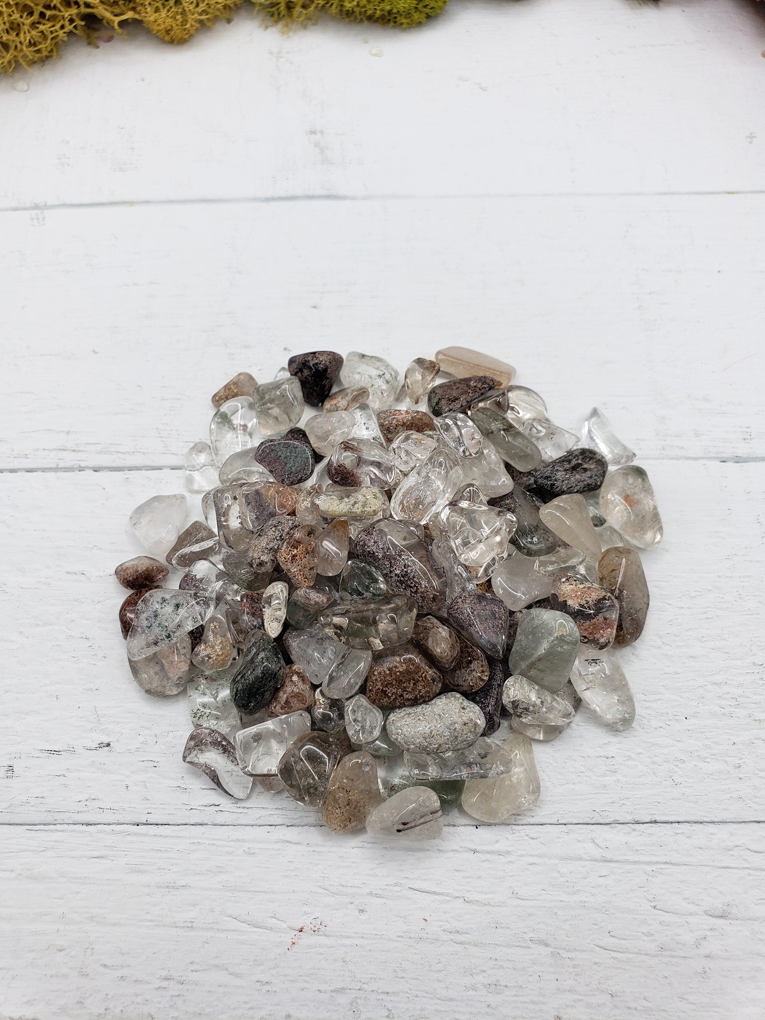 Two ounces of green phantom quartz chips on display