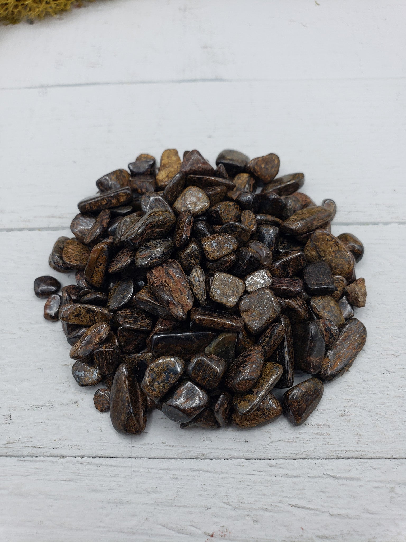 two ounces of bronzite chips on display