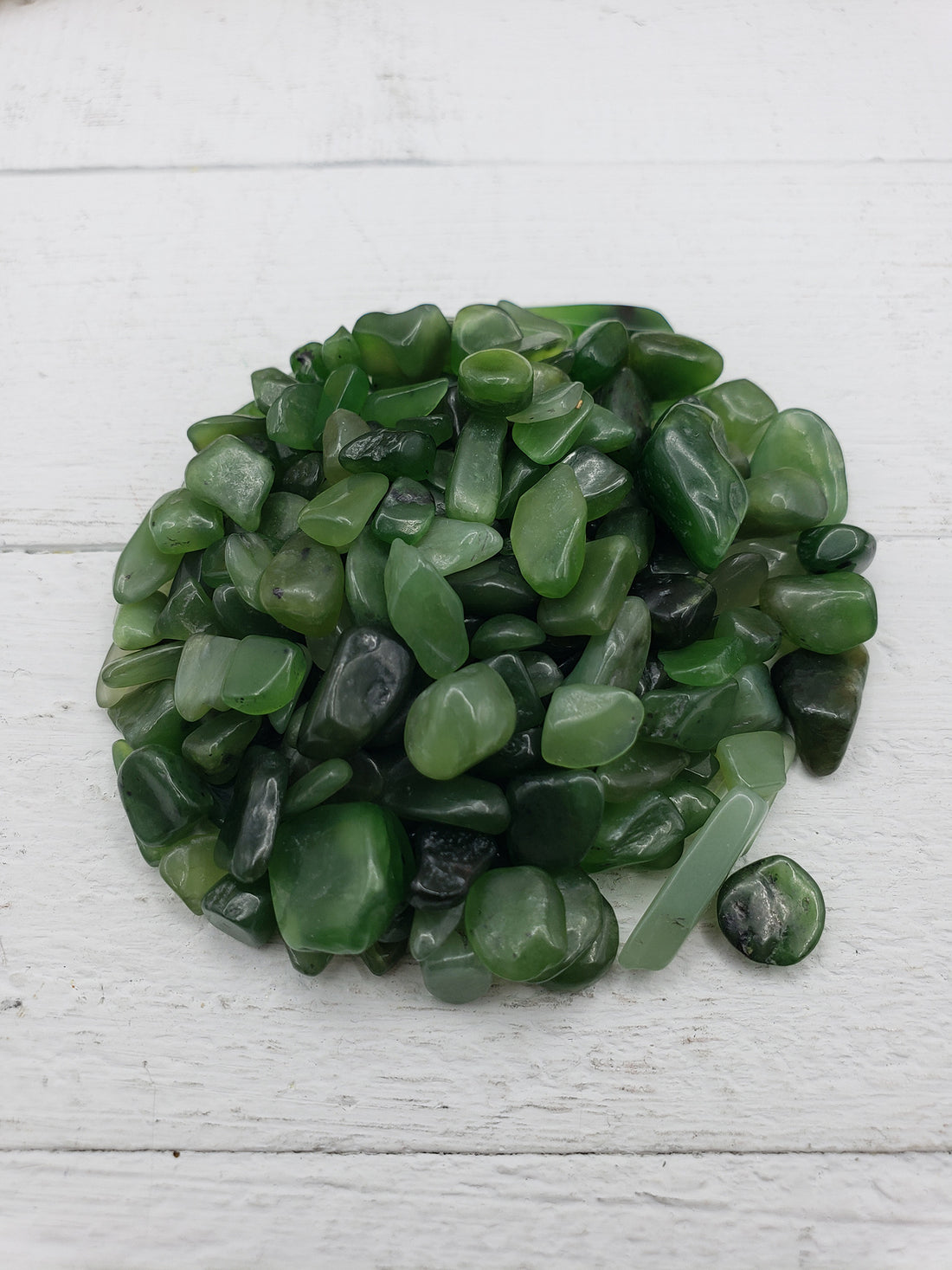 Two ounces of nephrite jade chips on display