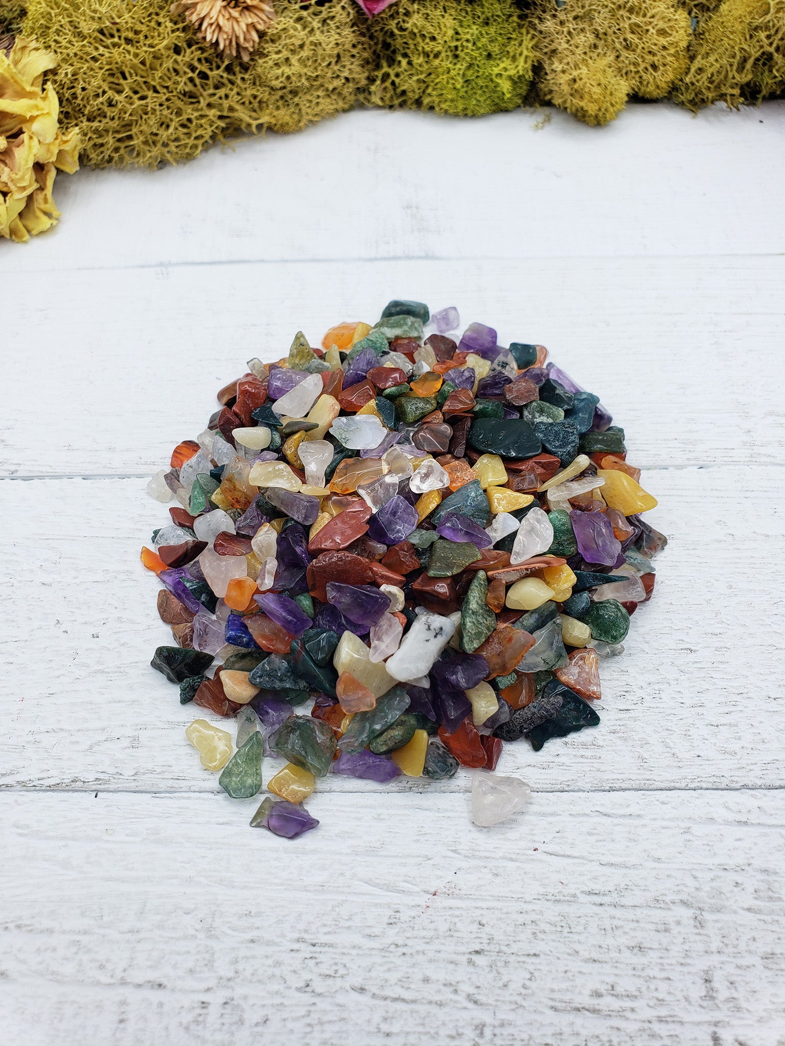 Two ounces of mixed gemstone crystal chips on display