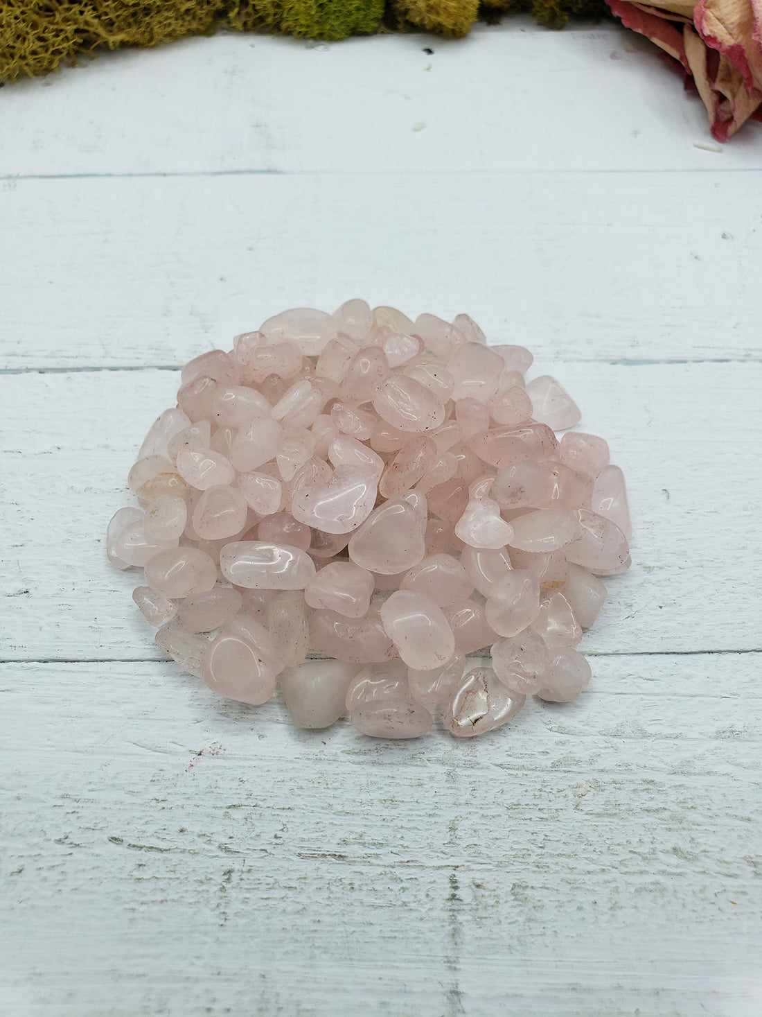 two ounces of rose quartz stone chips on display