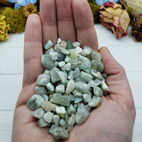 three ounces of amazonite chips in hand