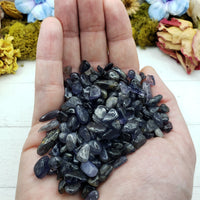 Three ounces of iolite crystal chips in hand
