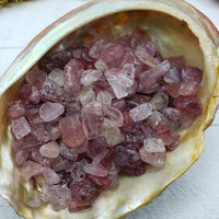 three ounces of strawberry quartz chips in abalone shell