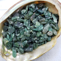 Green aventurine chips in abalone shell