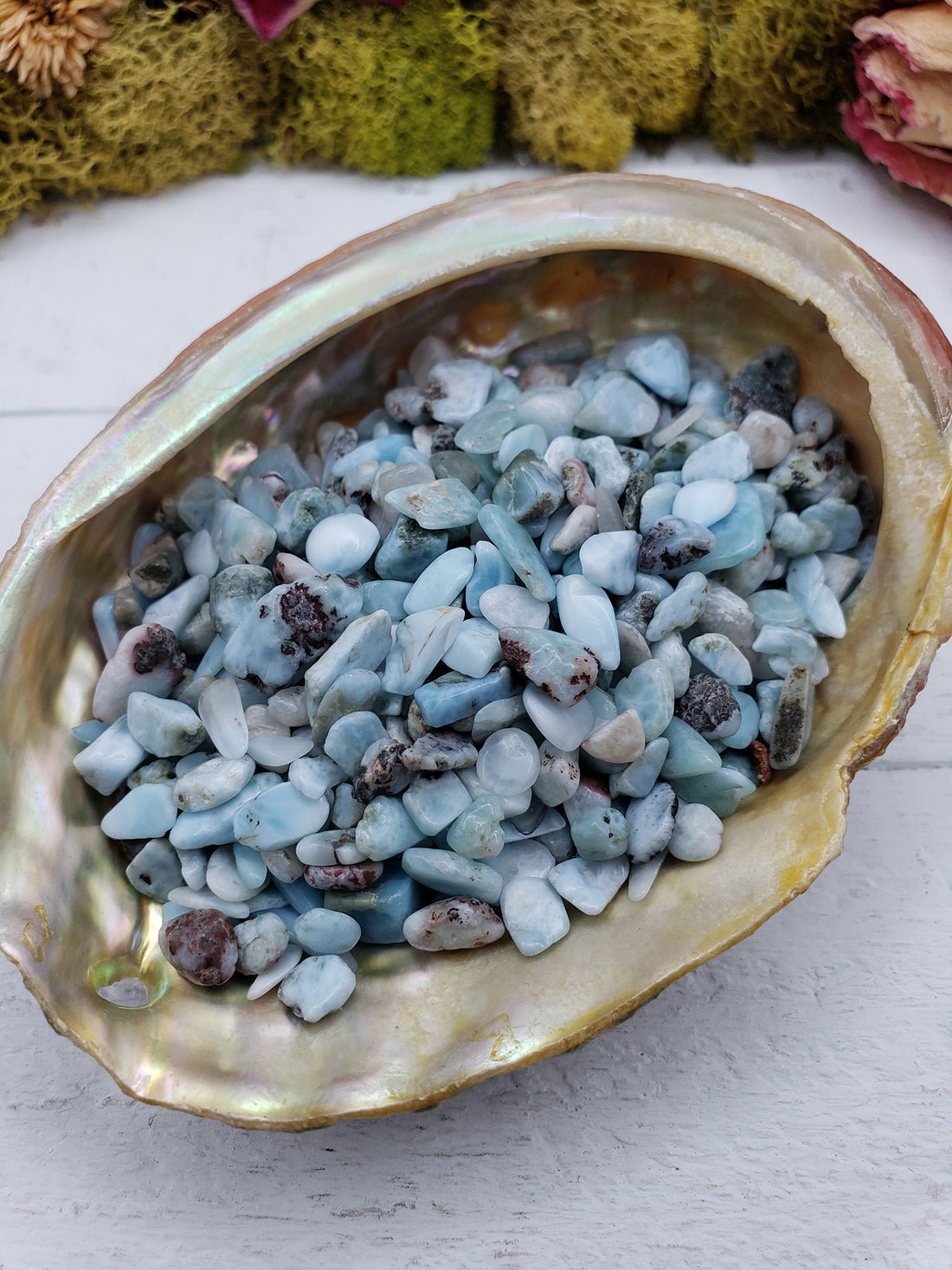 Three ounces of larimar chips in abalone shell