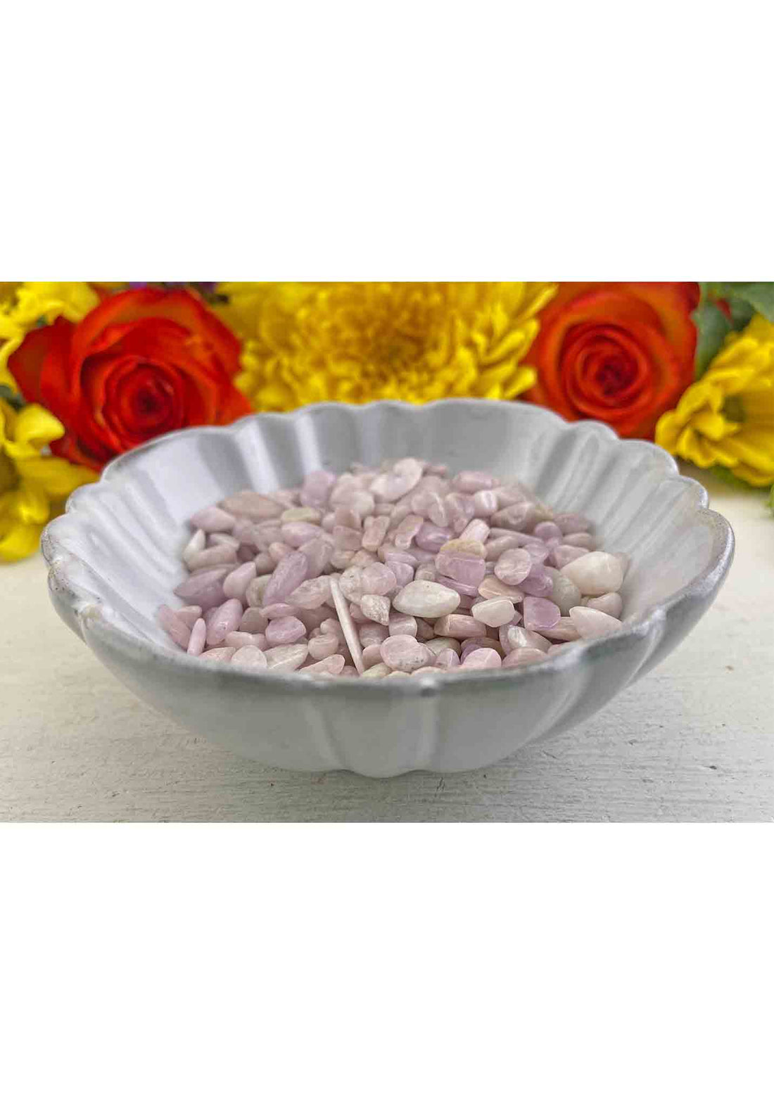 Four ounces of kunzite stone chips in bowl