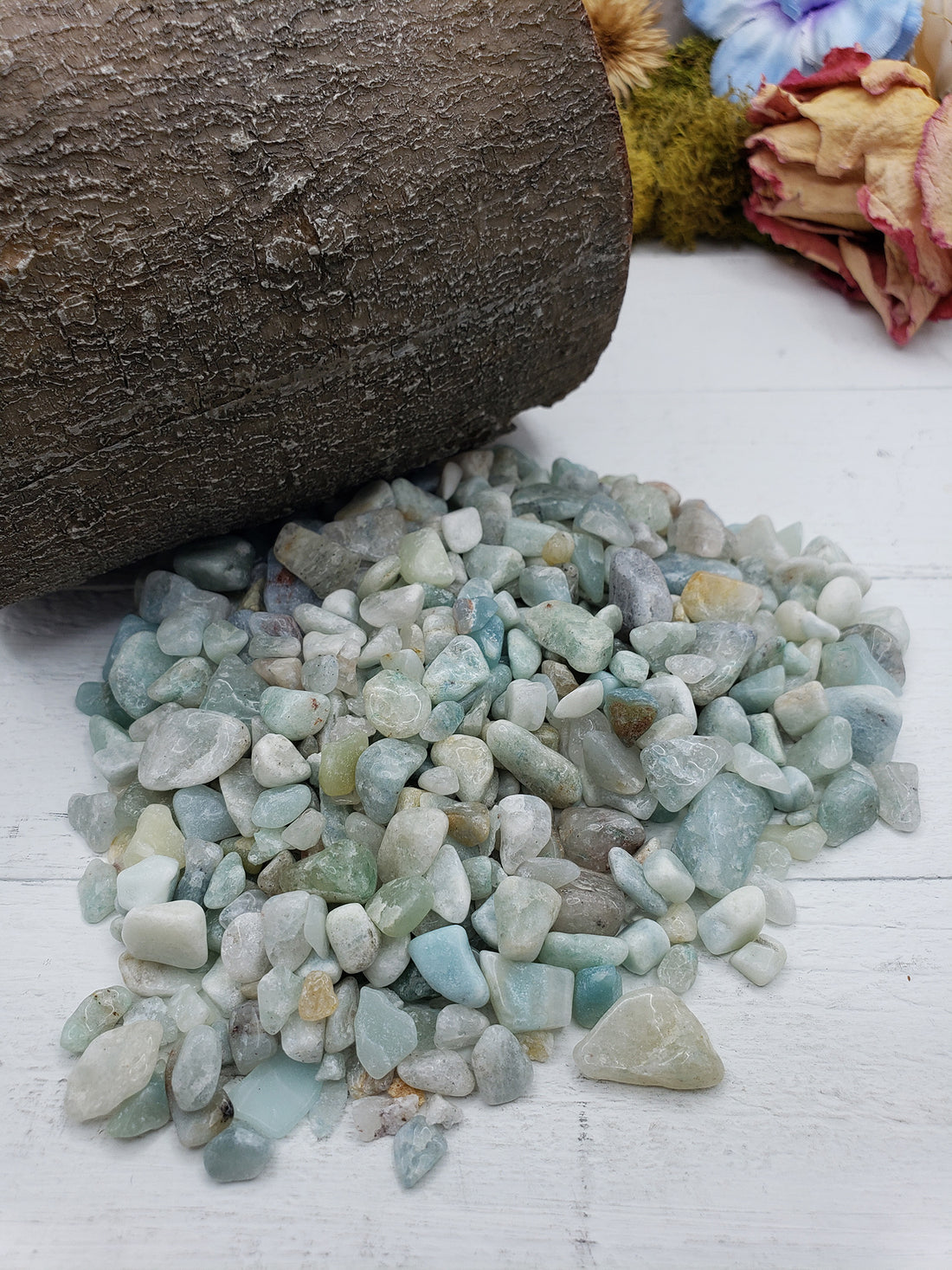 five ounces of amazonite stone chips on display