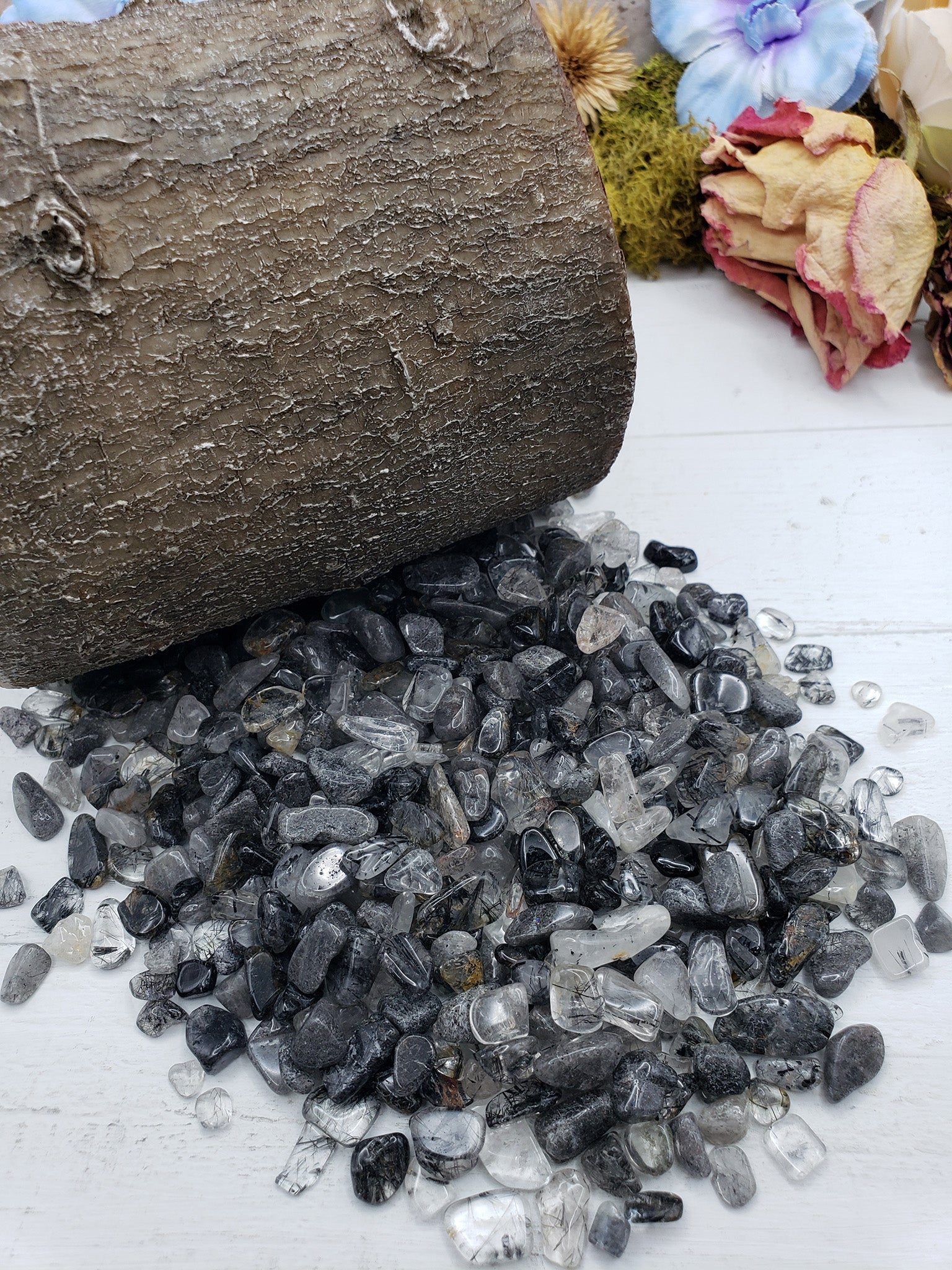 five ounces of black tourmaline rutilated quartz on display