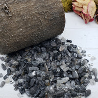 five ounces of black tourmaline rutilated quartz on display