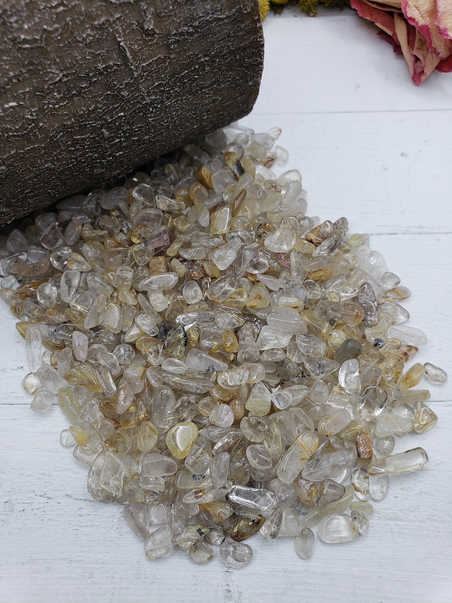 Five ounce old rutilated quartz chips on display