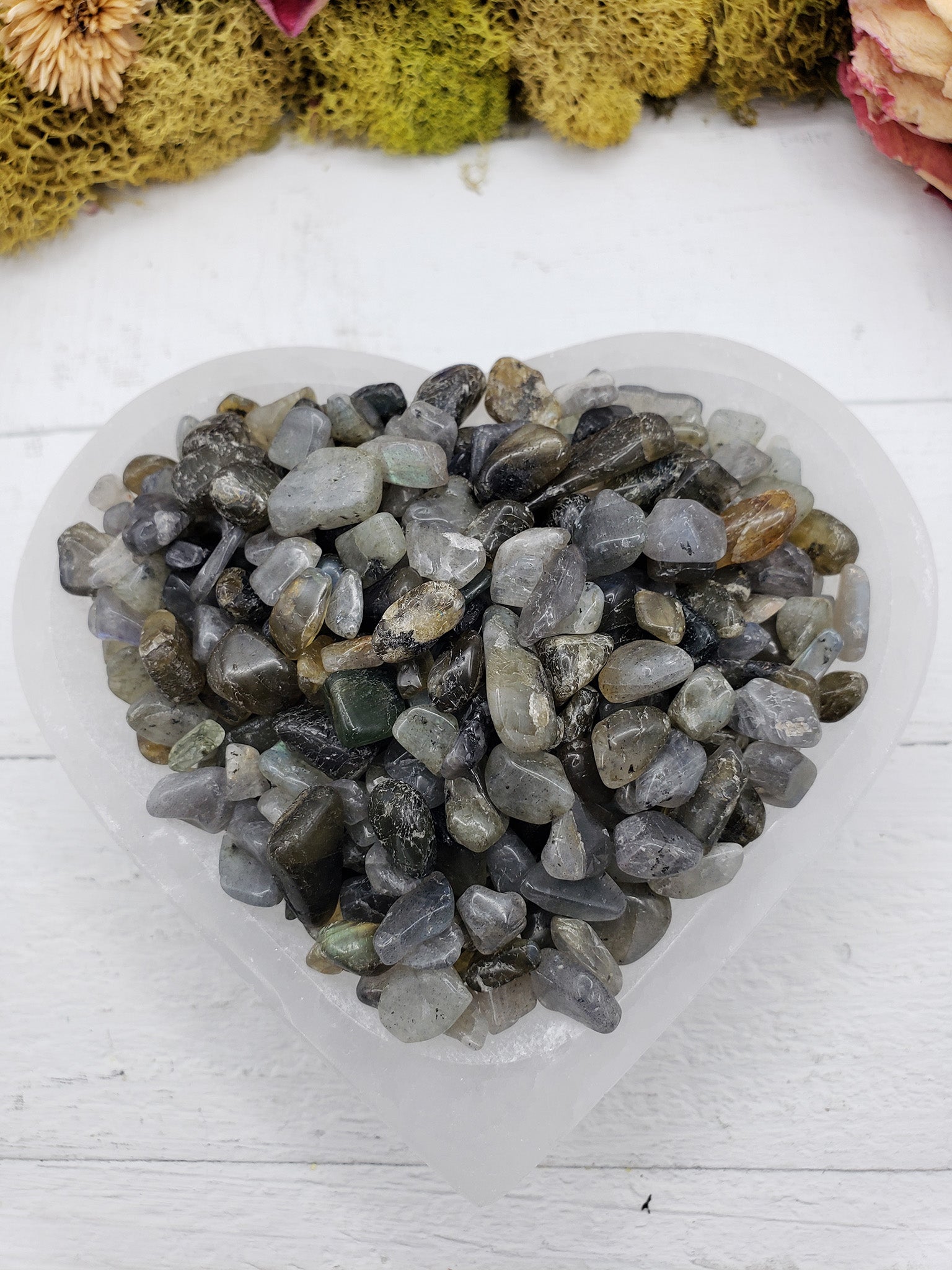 Five ounces of labradorite crystal chips in selenite bowl