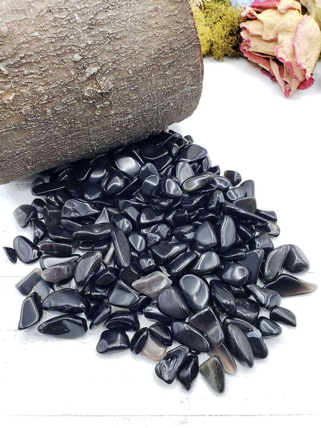 Five ounces of obsidian stone chips on display