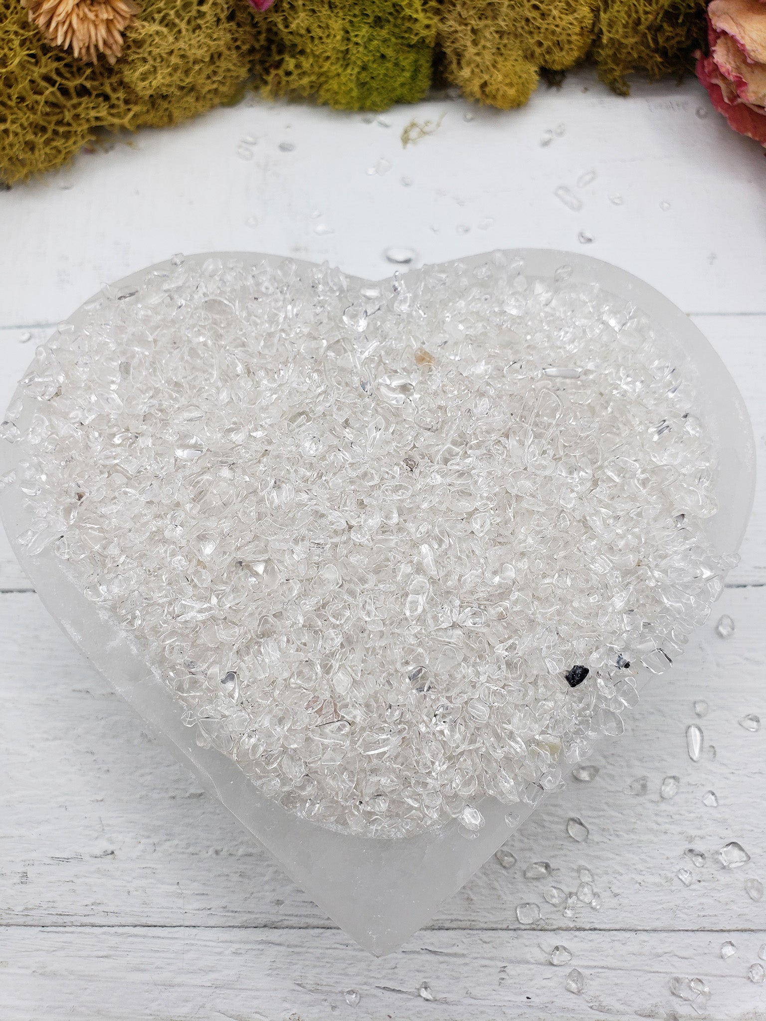 five ounces of quartz crystal chips in selenite bowl