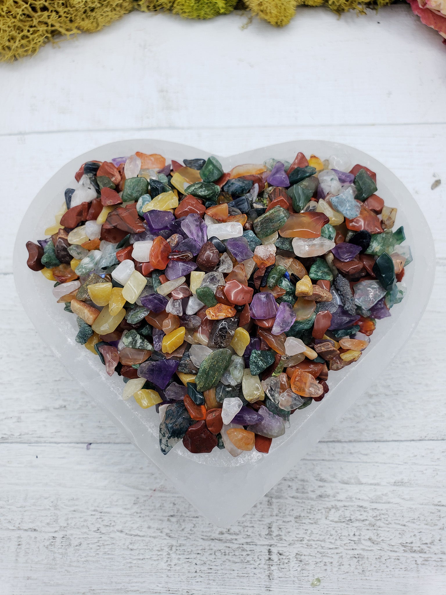 Five ounces of mixed gemstone crystal chips in selenite bowl