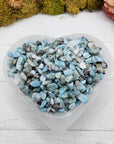 Five ounces of larimar stone chips in selenite bowl