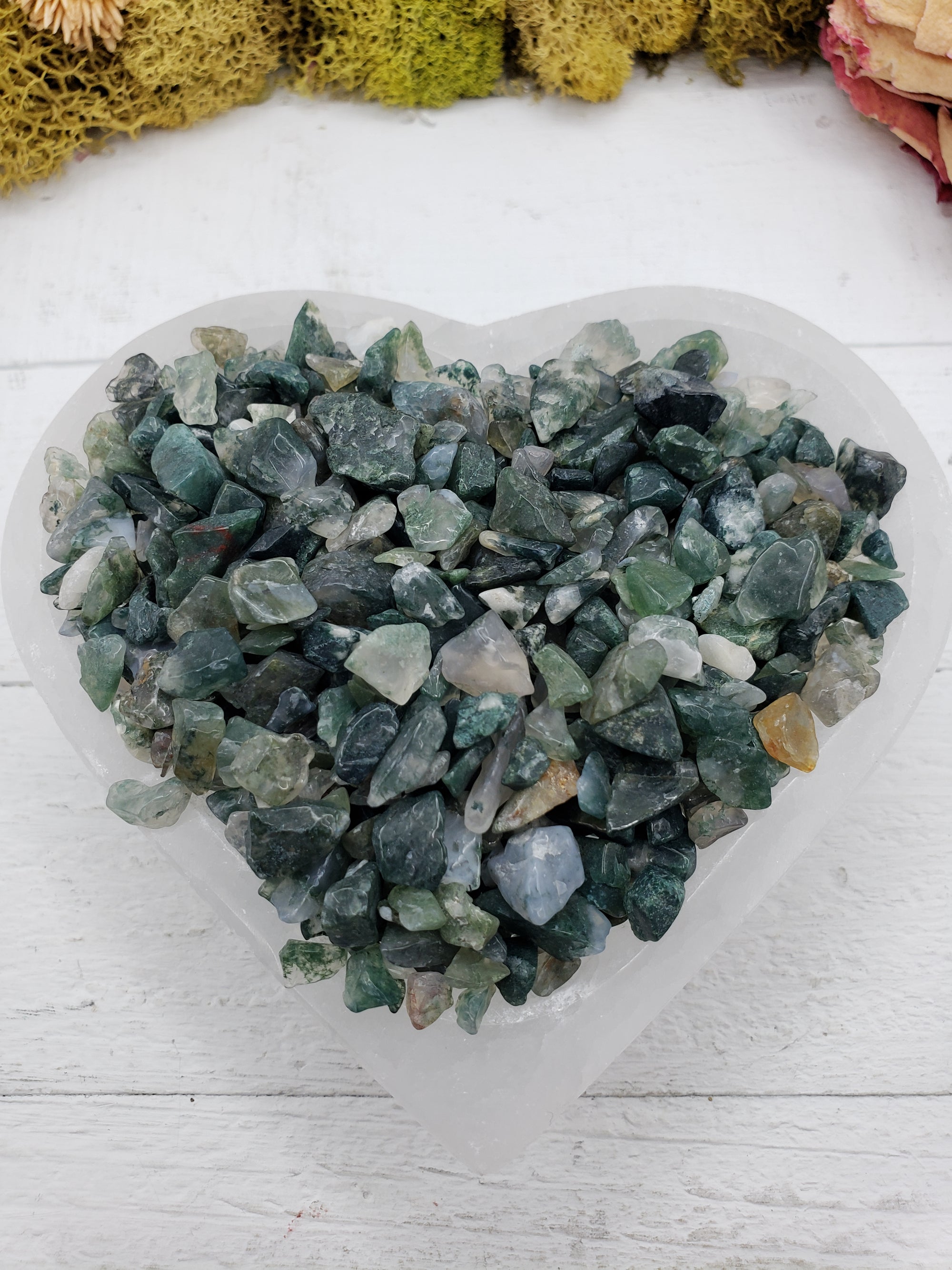 Five ounces of moss agate chips in selenite bowl