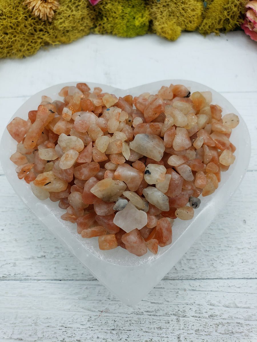 five ounces of sunstone crystal chips in abalone shell