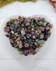 Five ounces of mixed multi tourmaline crystal chips in selenite bowl