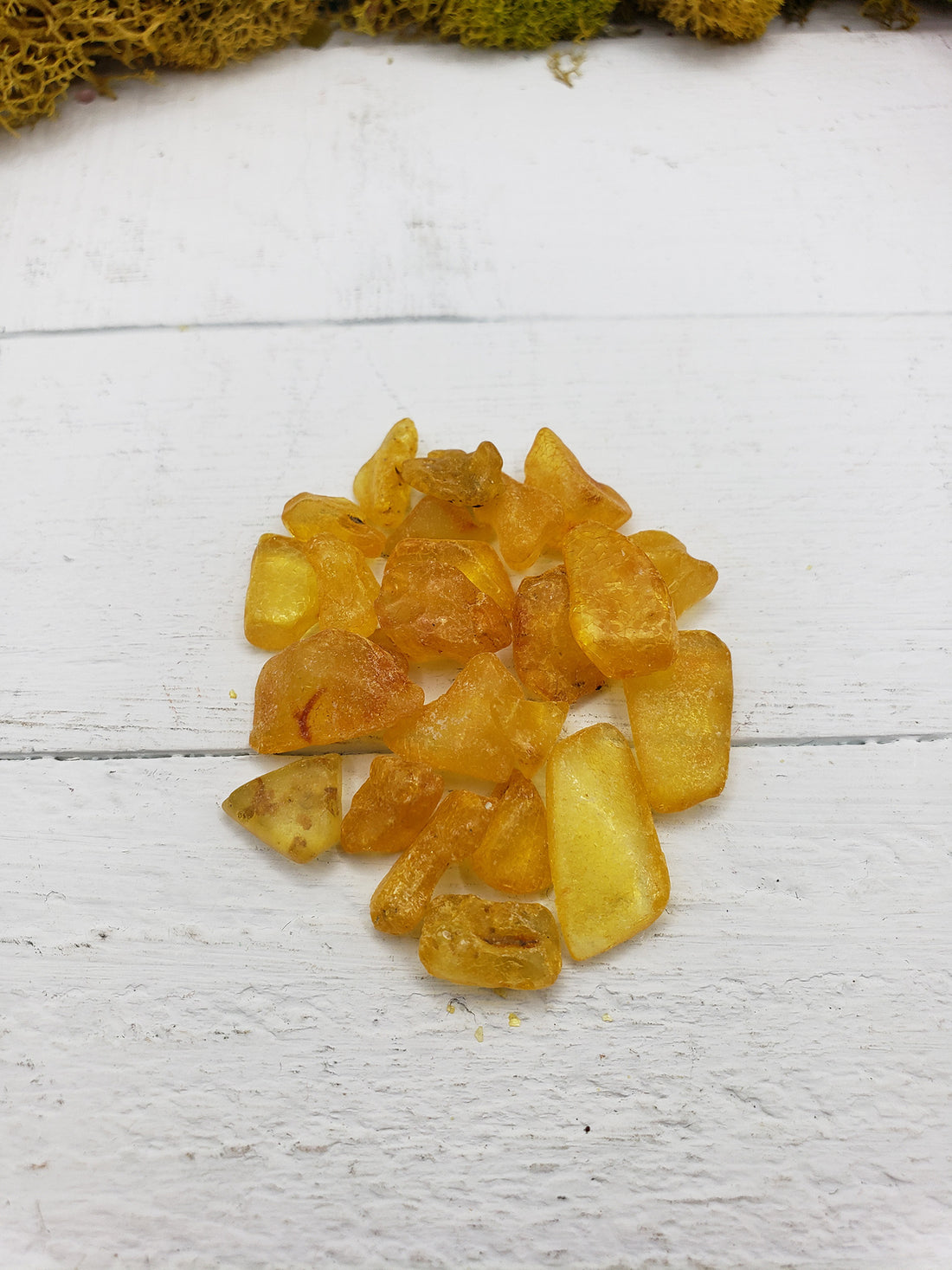 6 grams of amber stone chips on display
