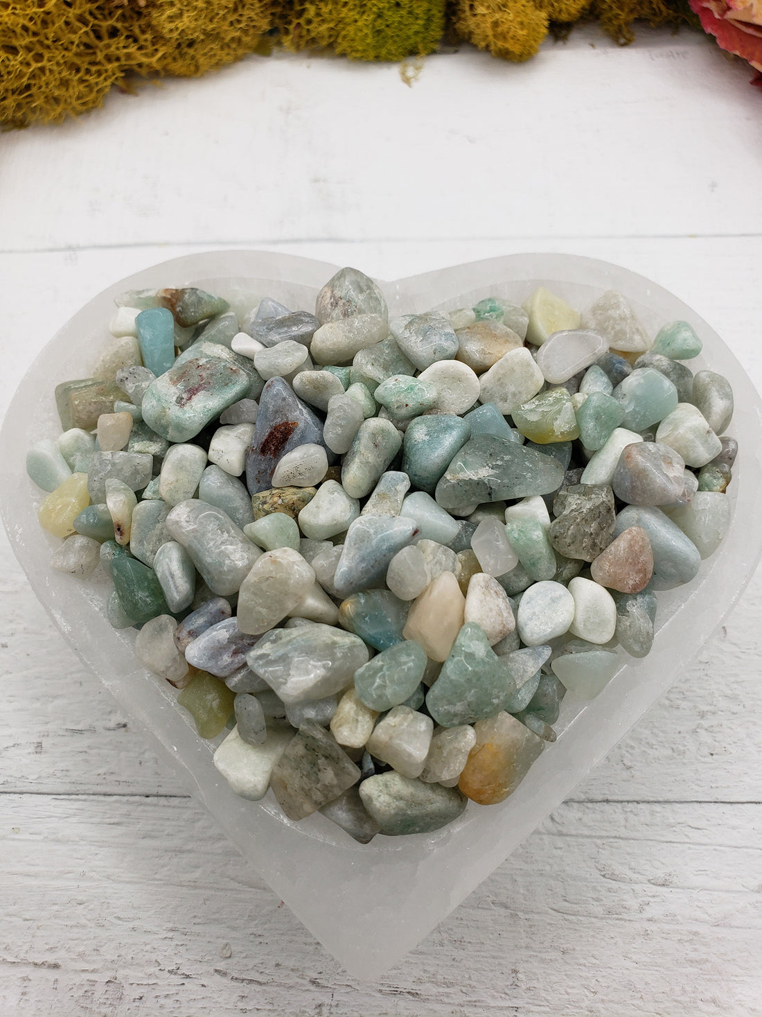 six ounces of amazonite stone chips in selenite bowl