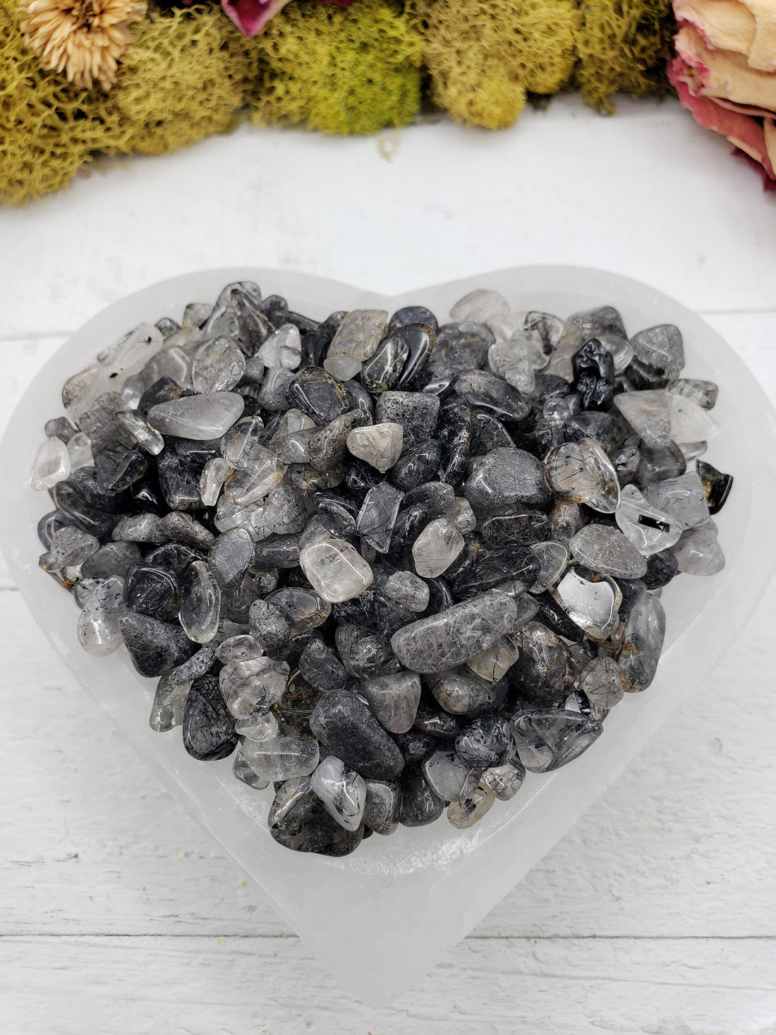 six ounces of black tourmaline rutilated quartz in selenite bowl