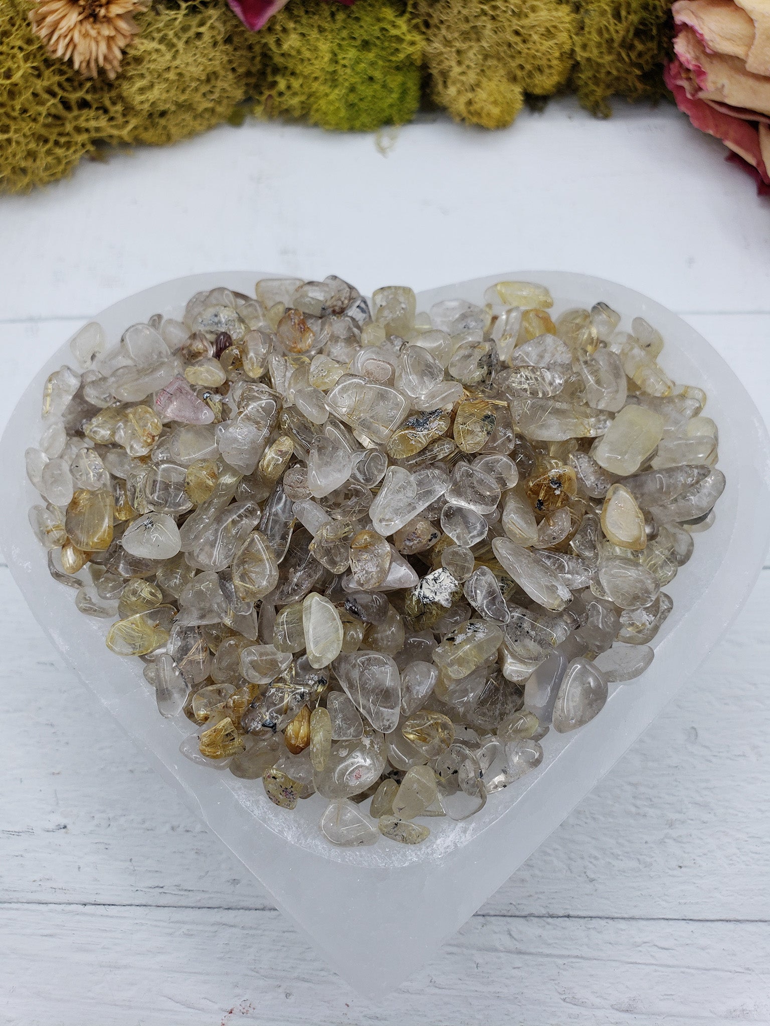 Six ounce gold rutilated quartz chips in selenite bowl