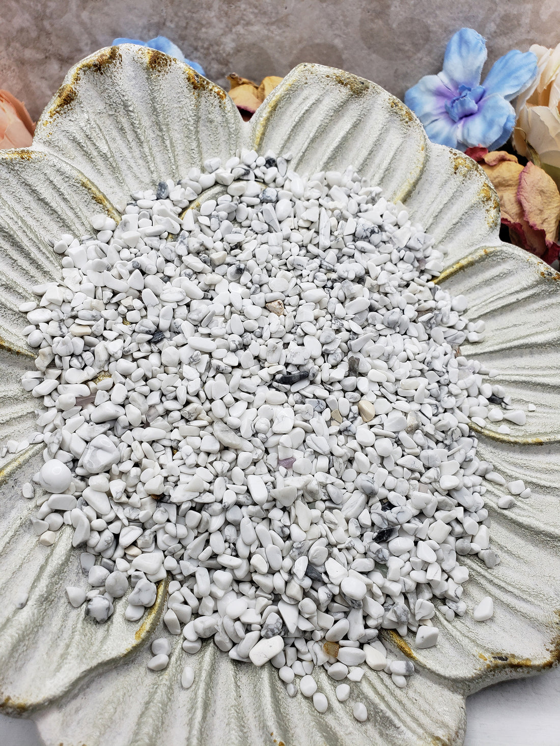 Seven ounces of crystal chips  on floral display dish
