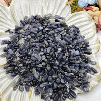 Seven ounces of iolite crystal chips on prop display