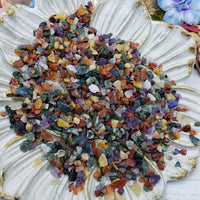Seven ounces of mixed gemstone crystal chips on floral dish display