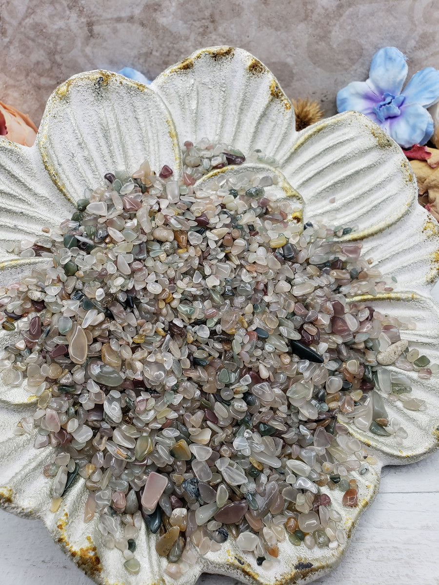 Seven ounces of mixed agate crystal chips on floral dish display