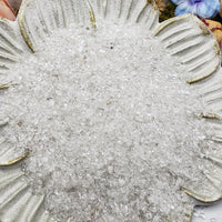 seven ounces of quartz crystal chips on floral display